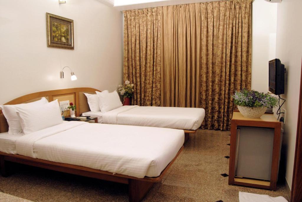 The Ambience Hotel プネ 部屋 写真