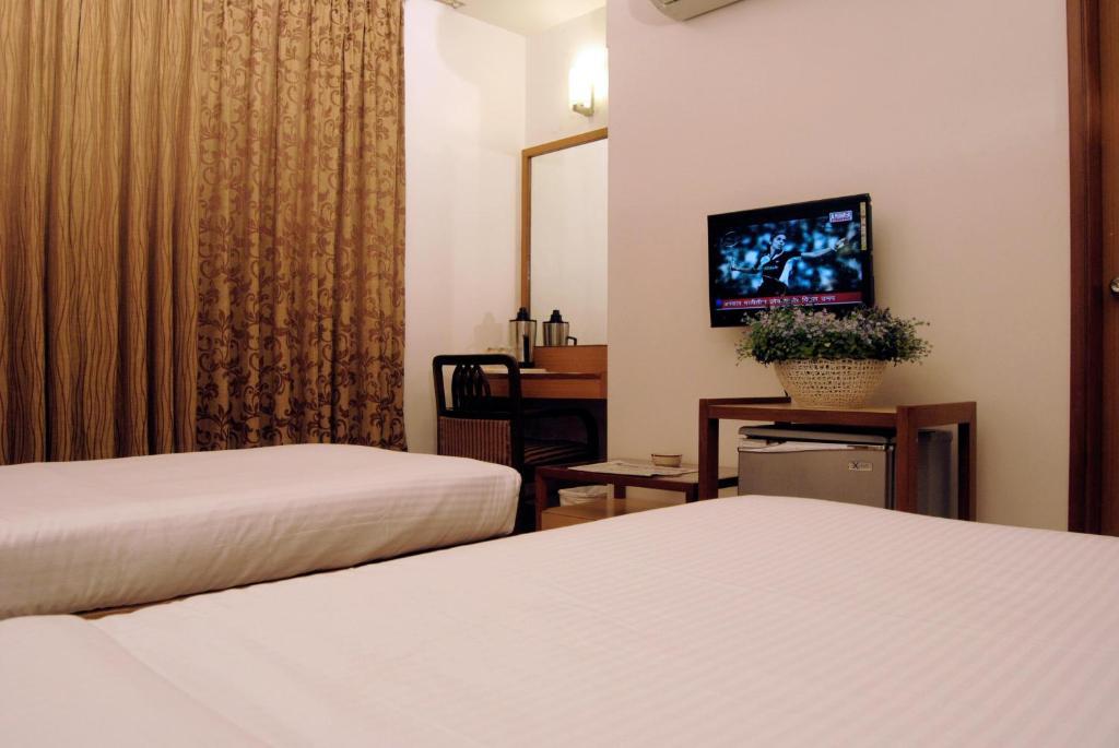The Ambience Hotel プネ 部屋 写真